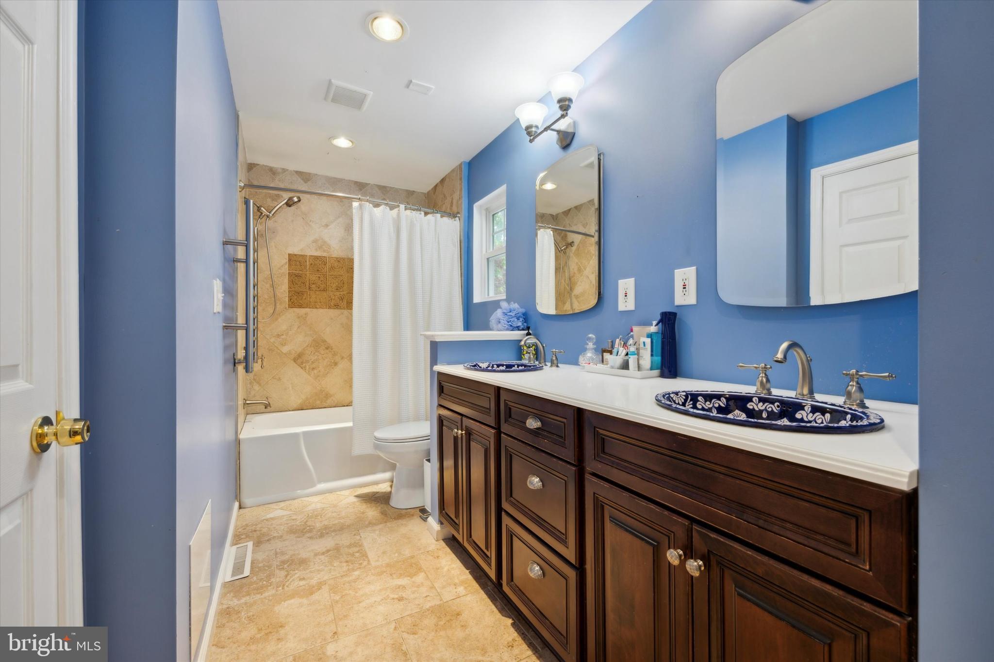 33 Ridge Road Malvern, PA 19355 - Photo 16 of 31 Primary Bath, two sinks, tub/shower & towel warmer