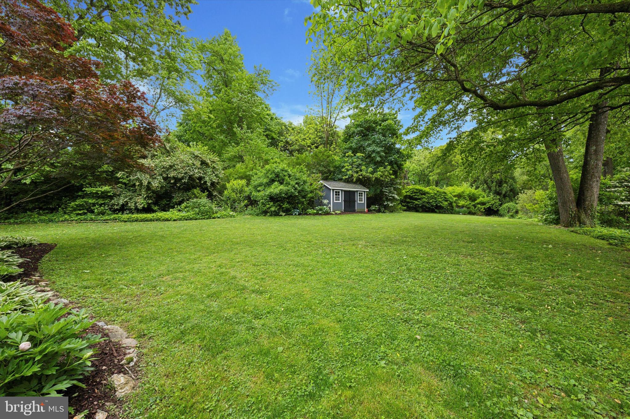 33 Ridge Road Malvern, PA 19355 - Photo 27 of 31 View from Deck across the large, private yard