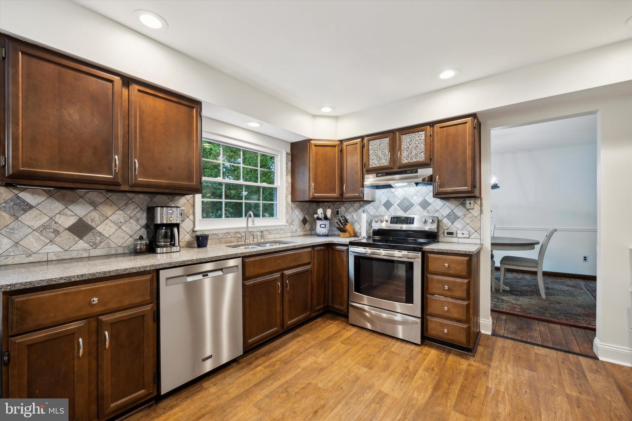 33 Ridge Road Malvern, PA 19355 - Photo 7 of 31 Stainless appliances, double sink, tile backsplash