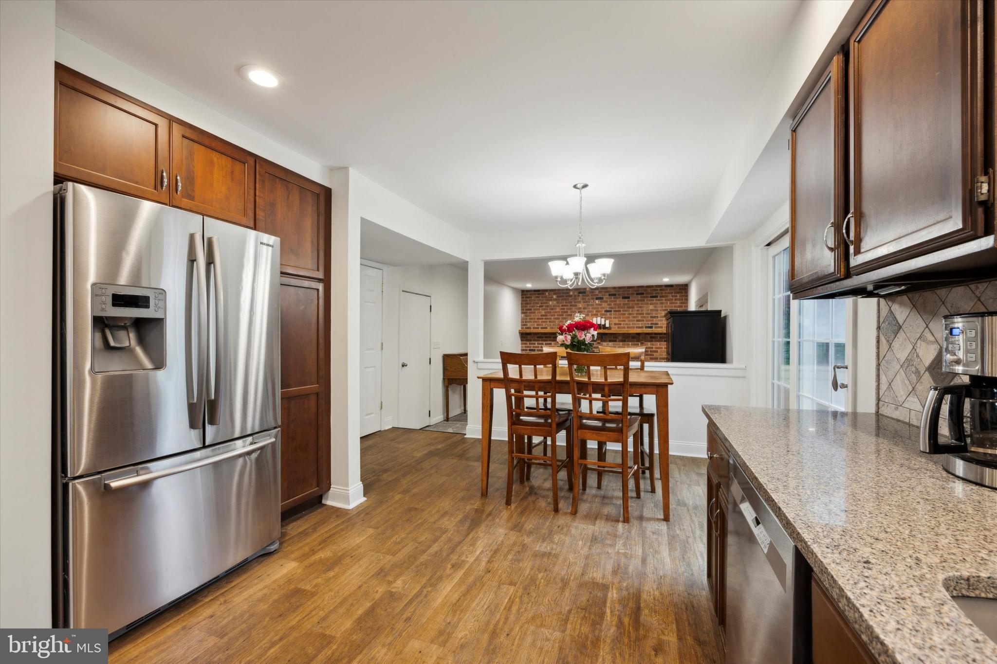 33 Ridge Road Malvern, PA 19355 - Photo 9 of 31 Quartz counters. Kitchen opens to Family Room