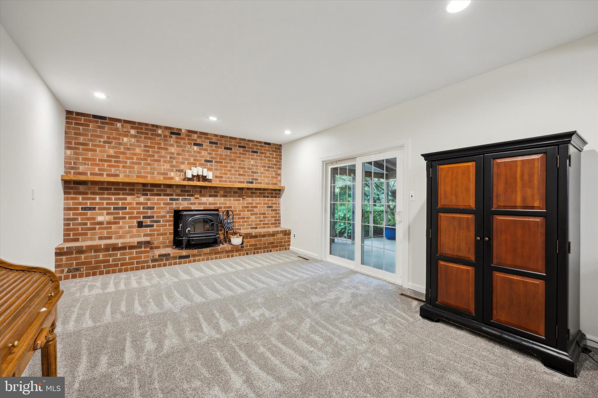 33 Ridge Road Malvern, PA 19355 - Photo 10 of 31 Family Room with brick Fireplace mantle & seating