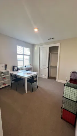 a stove top oven sitting inside of a kitchen