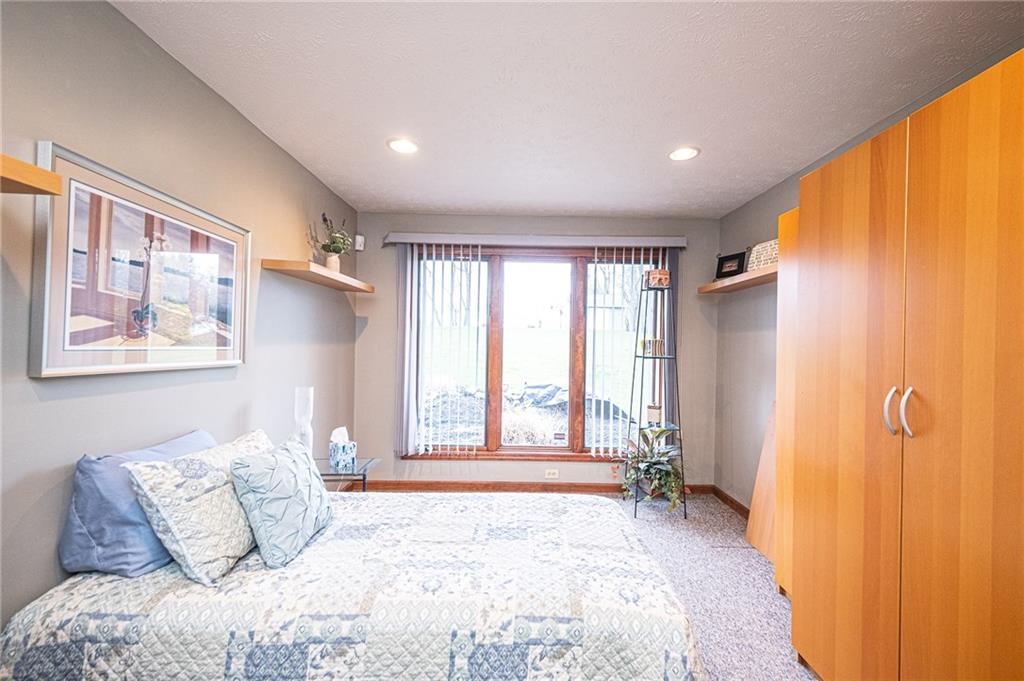630 Hemlock Road Coraopolis, PA 15108 - Photo 12 of 25 Fourth bedroom on the main floor with tons of natural light looking out to the private backyard. It could also be a second home office if needed.
