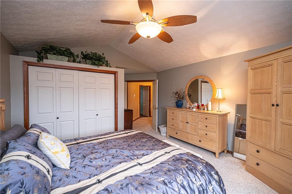630 Hemlock Road Coraopolis, PA 15108 - Photo 14 of 25 Large master bedroom with cathedral ceiling and large windows for ample light leading into the en suite bath.