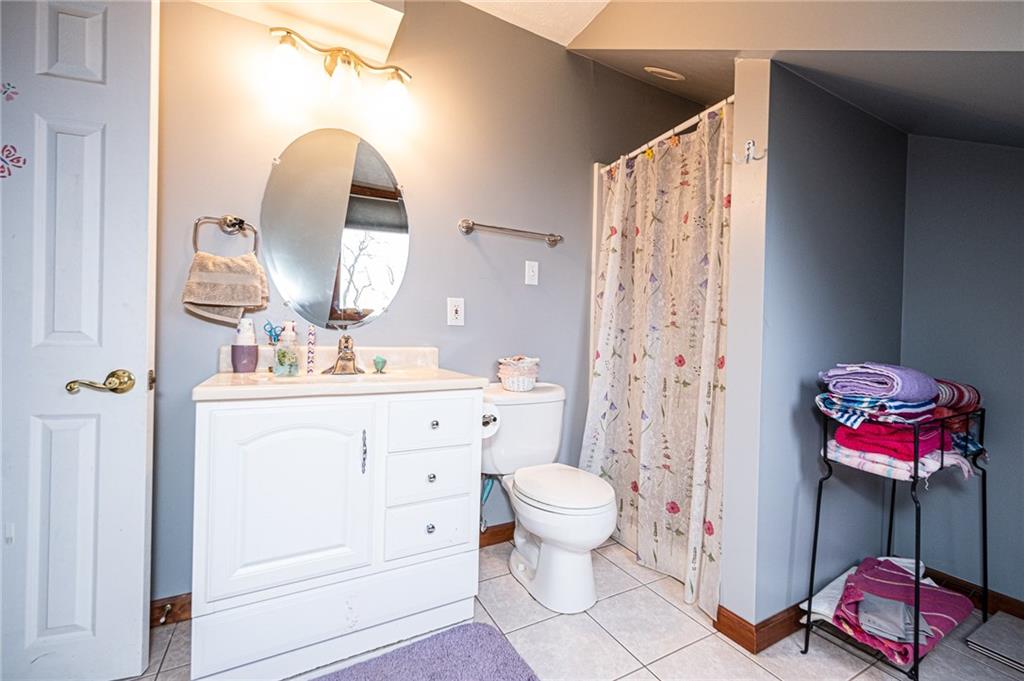 630 Hemlock Road Coraopolis, PA 15108 - Photo 19 of 25 Updated full bath for third upstairs bedroom. The bathroom includes an separate vanity table area.
