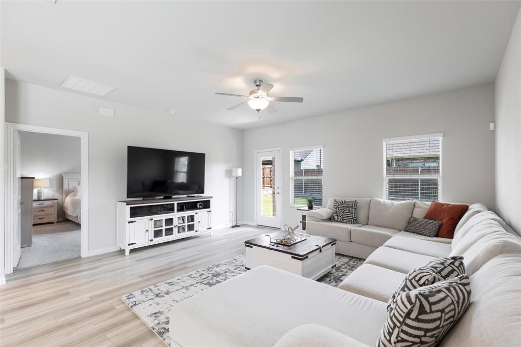 1504 Cobblestone Road Melissa, TX 75454 - Photo 11 of 40 Open-concept layout connecting kitchen and dining effortlessly.