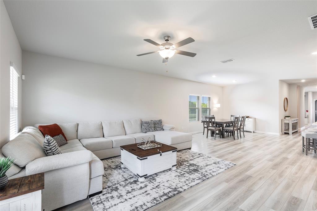 1504 Cobblestone Road Melissa, TX 75454 - Photo 13 of 40 Expansive living area designed for gathering and unwinding.