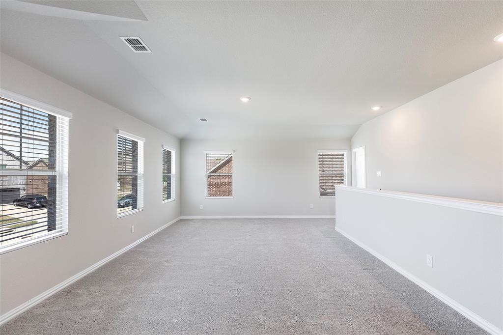 1504 Cobblestone Road Melissa, TX 75454 - Photo 22 of 40 Upstairs living area thoughtfully separated from the main-level primary suite.