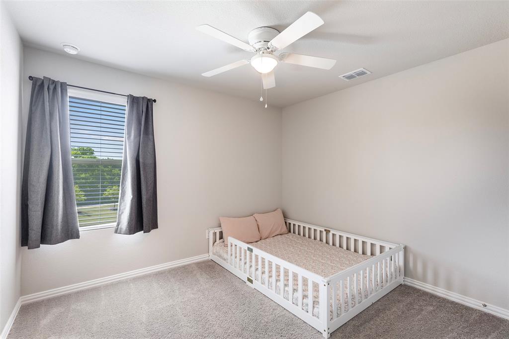 1504 Cobblestone Road Melissa, TX 75454 - Photo 26 of 40 3rd Bright upstairs bedroom with peaceful neighborhood views.