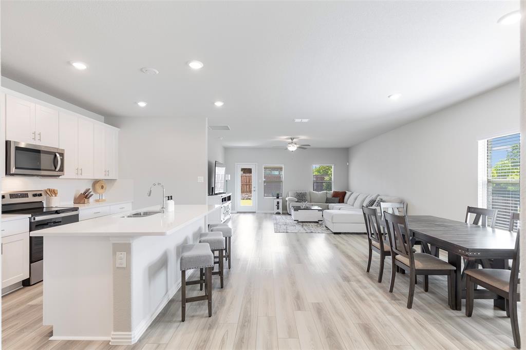 1504 Cobblestone Road Melissa, TX 75454 - Photo 3 of 40 Seamless living anchored by a generous gathering space.