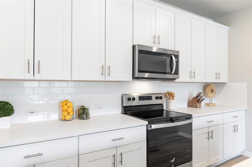 1504 Cobblestone Road Melissa, TX 75454 - Photo 8 of 40 Crisp finishes paired with functional layout for everyday living.