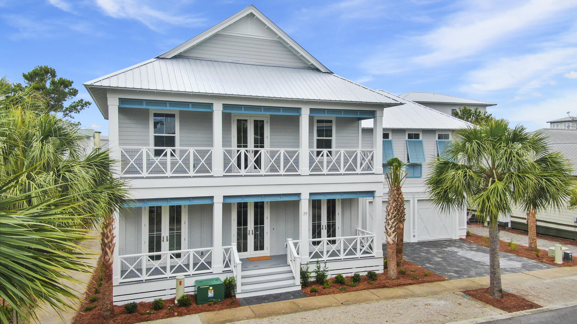 39 Beach Bike Way Inlet Beach Inlet Beach, FL 32461 - Photo 1 of 47 a front view of a house with a porch