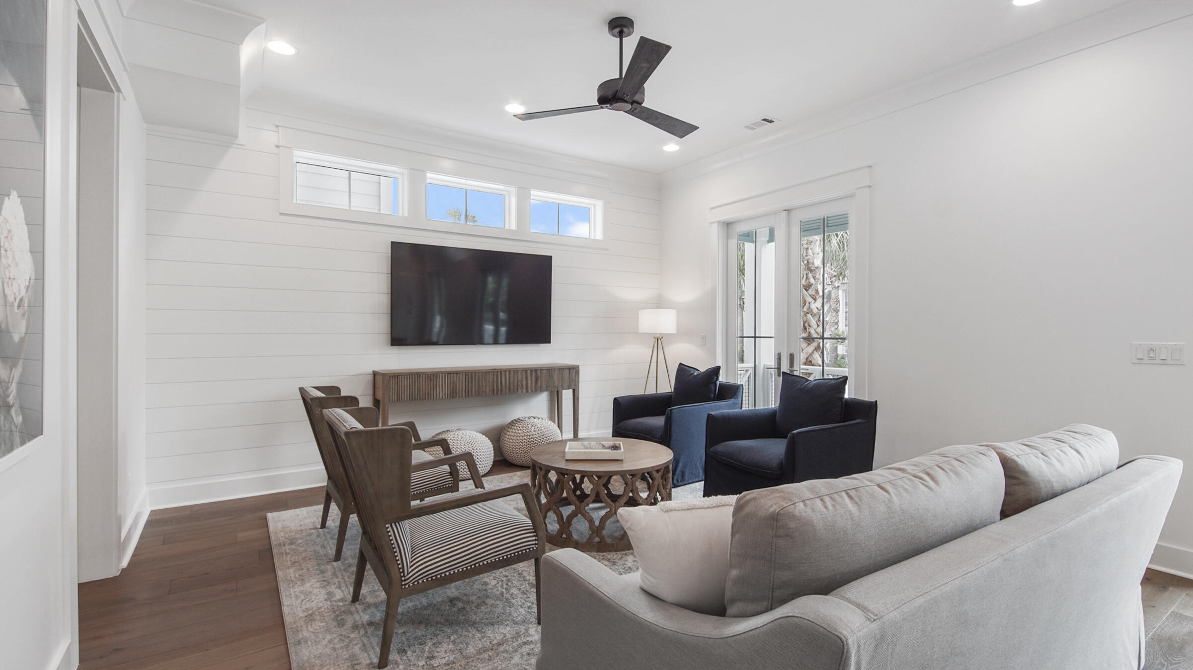 39 Beach Bike Way Inlet Beach Inlet Beach, FL 32461 - Photo 13 of 47 a living room with furniture a flat screen tv and a window
