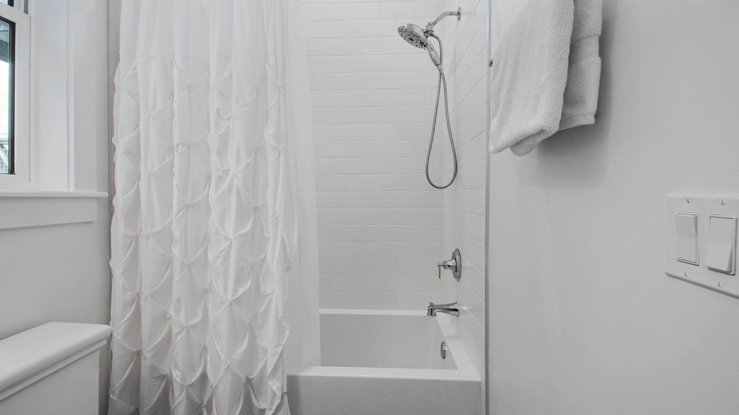 39 Beach Bike Way Inlet Beach Inlet Beach, FL 32461 - Photo 44 of 47 a bathroom with a bath tub and shower curtain