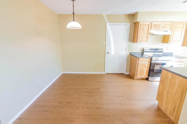 a view of a kitchen with a sink
