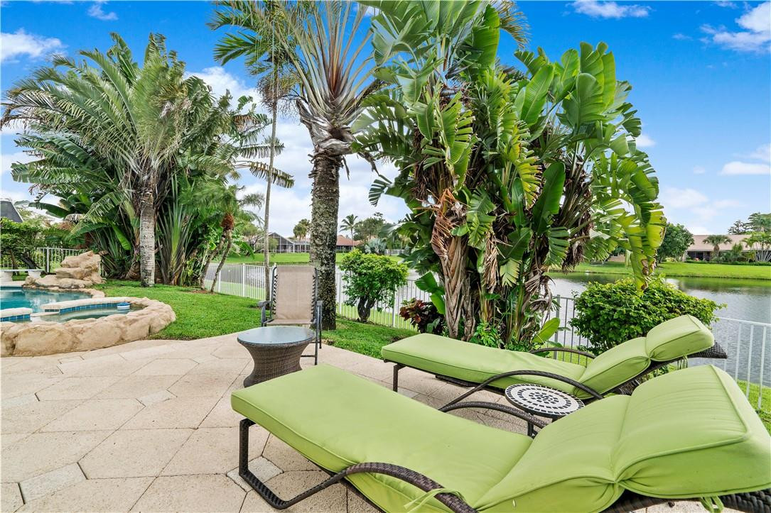 9695 West Lake Court Boca Raton, FL 33434 - Photo 31 of 43 a view of a two chairs in a yard