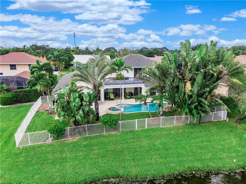 9695 West Lake Court Boca Raton, FL 33434 - Photo 42 of 43 a view of house with a big yard
