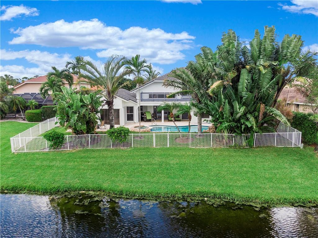 9695 West Lake Court Boca Raton, FL 33434 - Photo 6 of 43 a view of a house with a yard