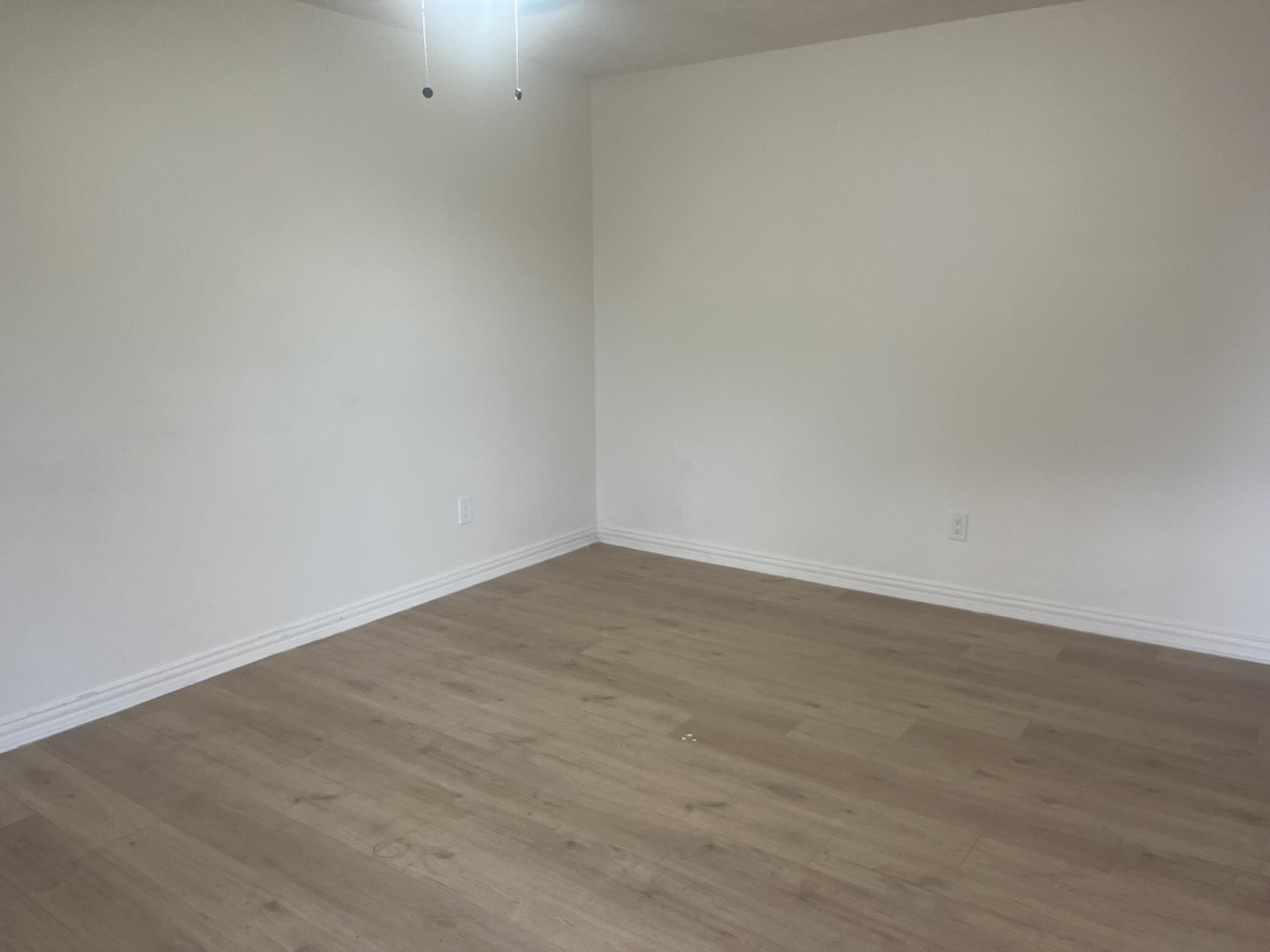 1906 70th Street Lubbock, TX 79412 - Photo 19 of 27 a view of an empty room