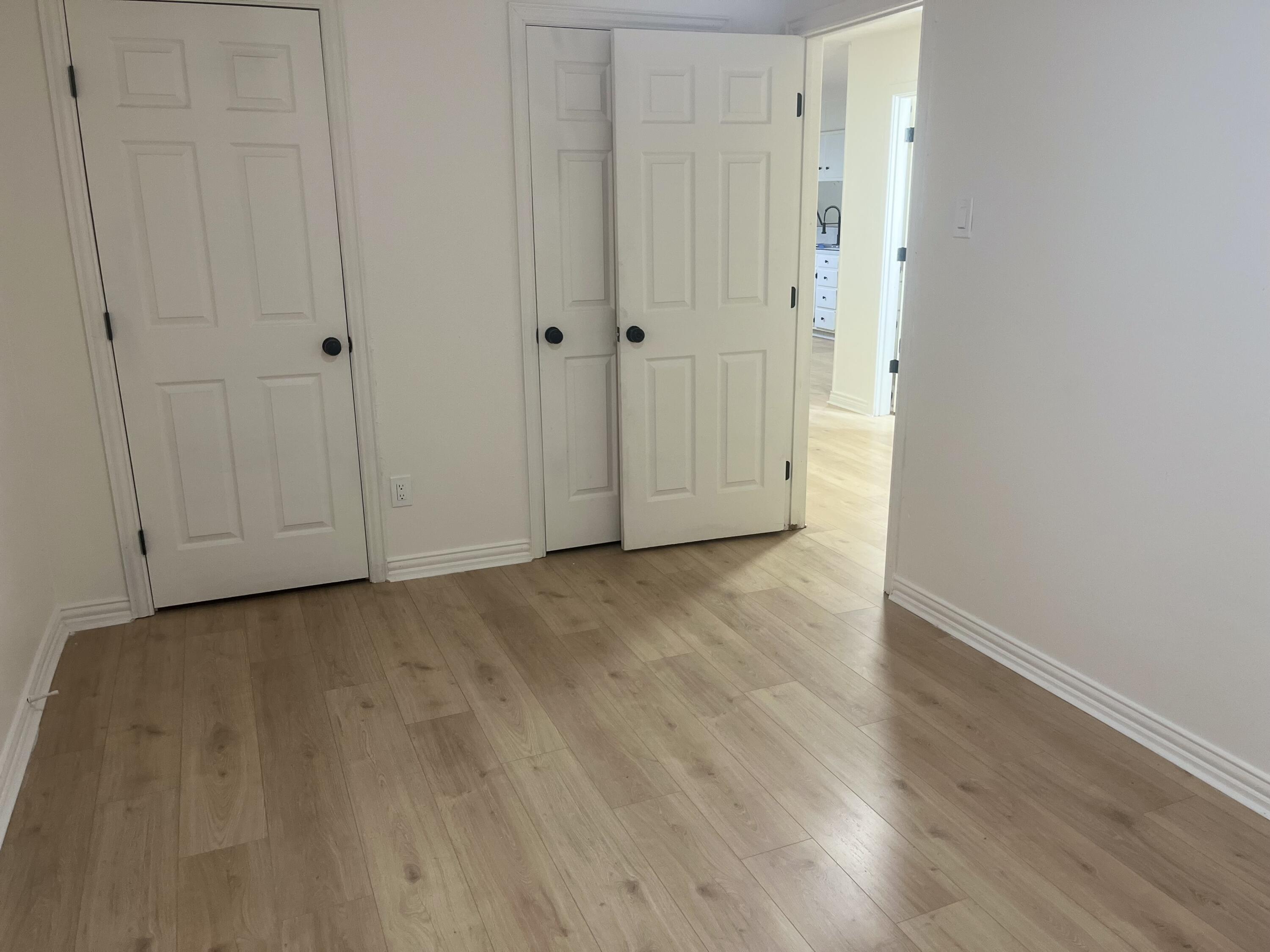 1906 70th Street Lubbock, TX 79412 - Photo 20 of 27 a view of empty room with wooden floor