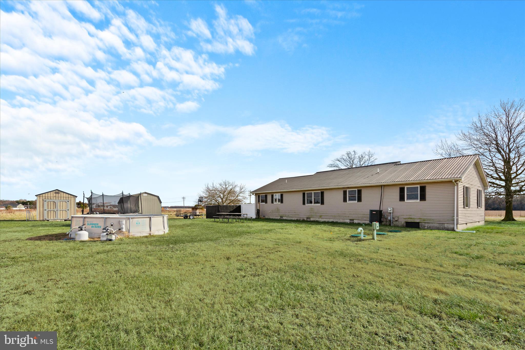 13171 Shiloh Church Road Laurel, DE 19956 - Photo 40 of 42 a view of a house with yard and sitting area