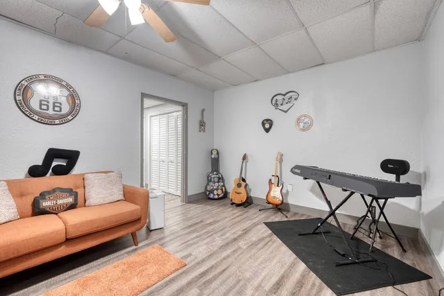 a view of a room with wooden floor