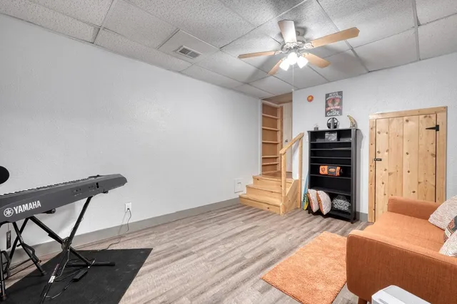 a bathroom with a sink mirror toilet and bathtub