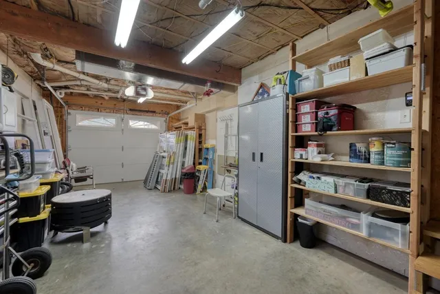 a view of a lush green hillside and a houses