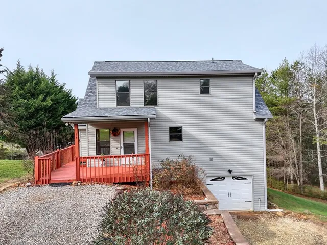 a view of street with flower in front of main door