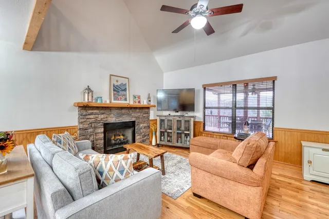a bedroom with a large bed and window