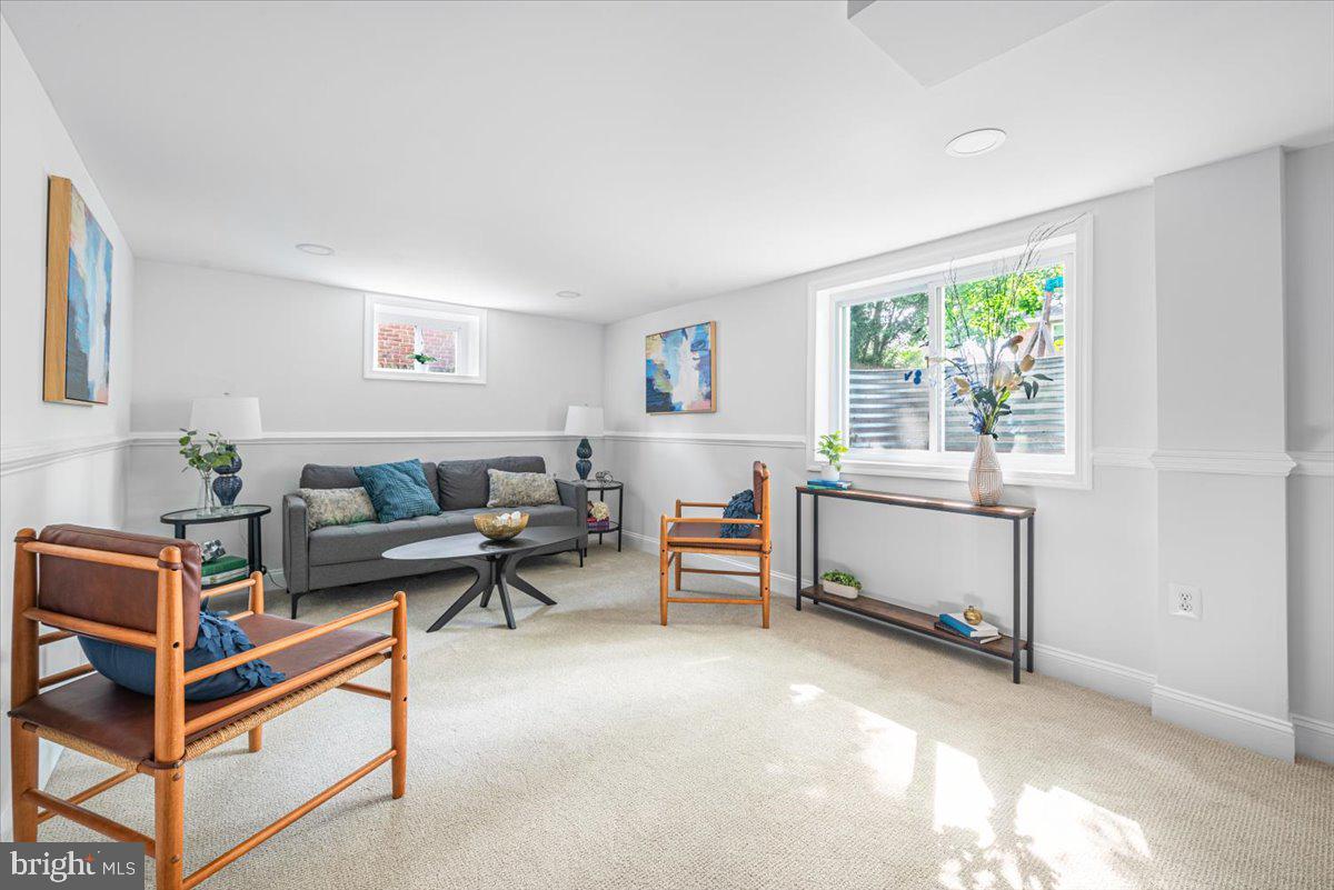 10112 Dallas Avenue Silver Spring, MD 20901 - Photo 19 of 32 a living room with furniture and a window