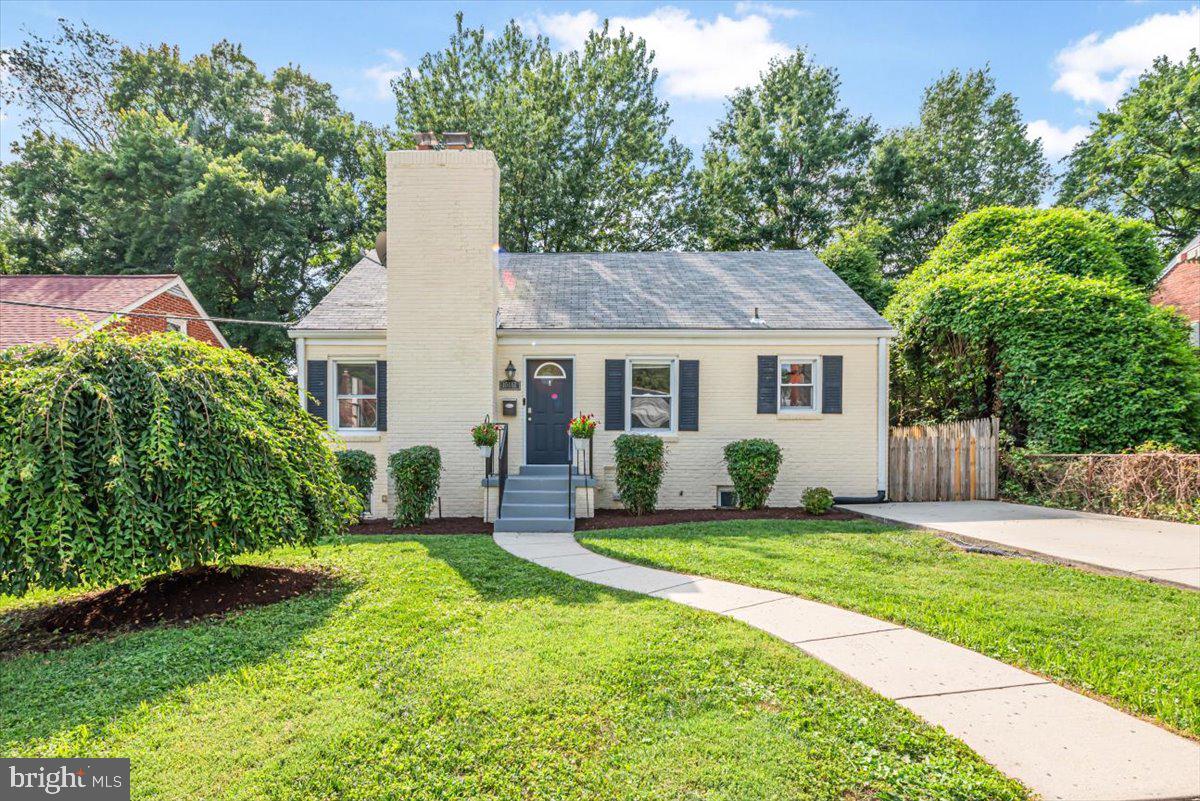 10112 Dallas Avenue Silver Spring, MD 20901 - Photo 2 of 32 a view of a house with a yard and sitting area