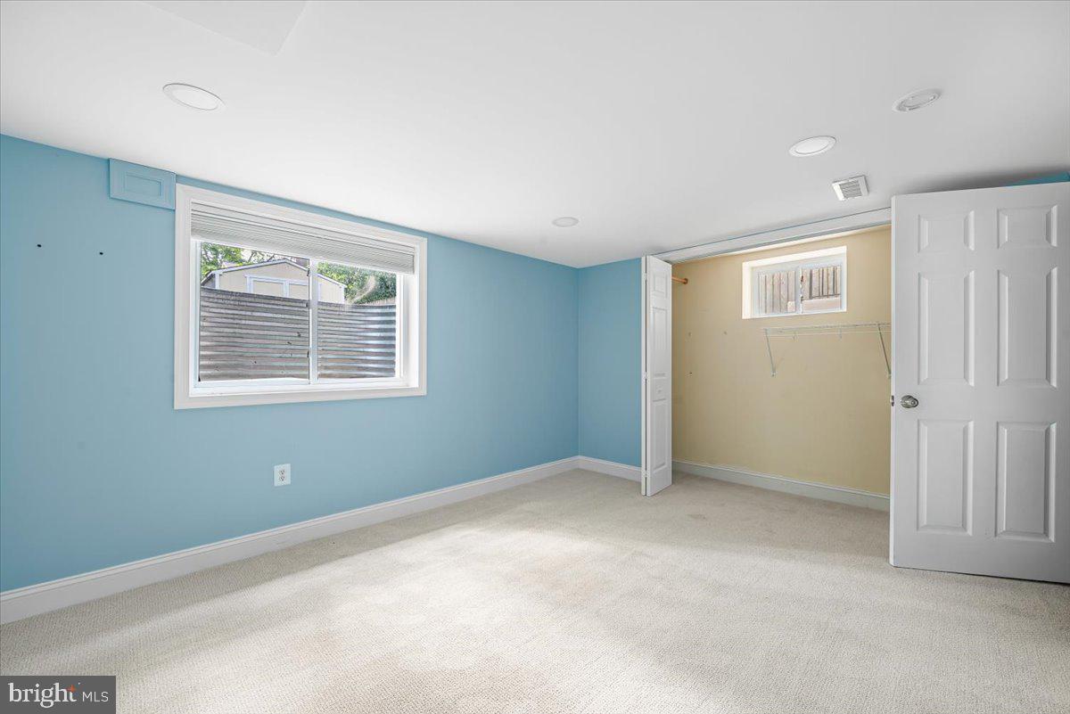10112 Dallas Avenue Silver Spring, MD 20901 - Photo 25 of 32 a view of an empty room with a window
