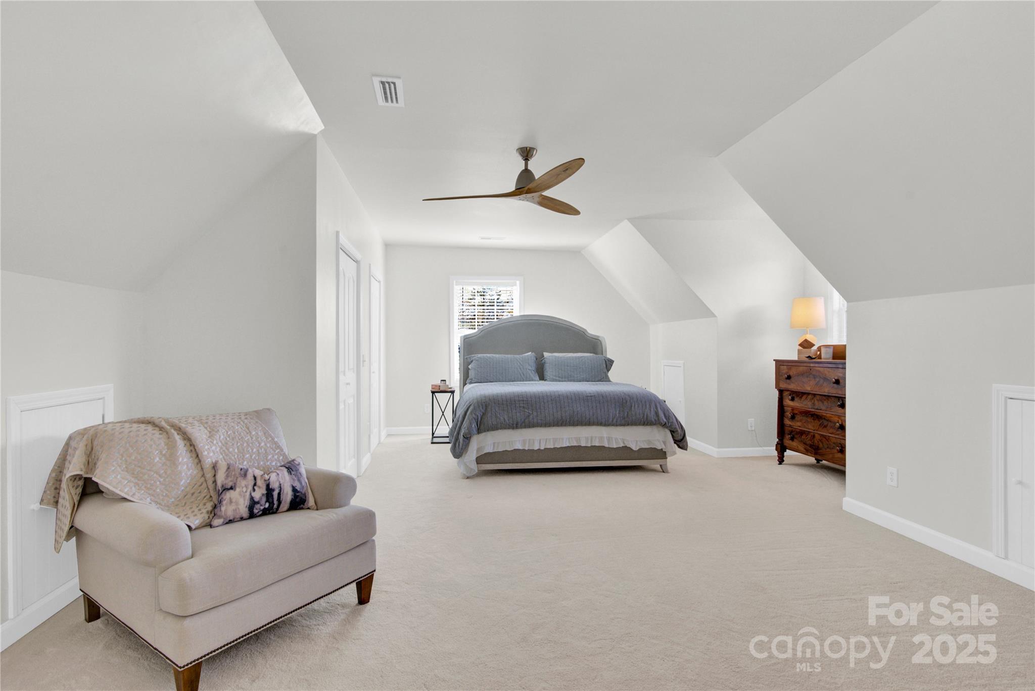 2441 27th Ave Circle Northeast Hickory, NC 28601 - Photo 18 of 45 a living room with furniture and a ceiling fan