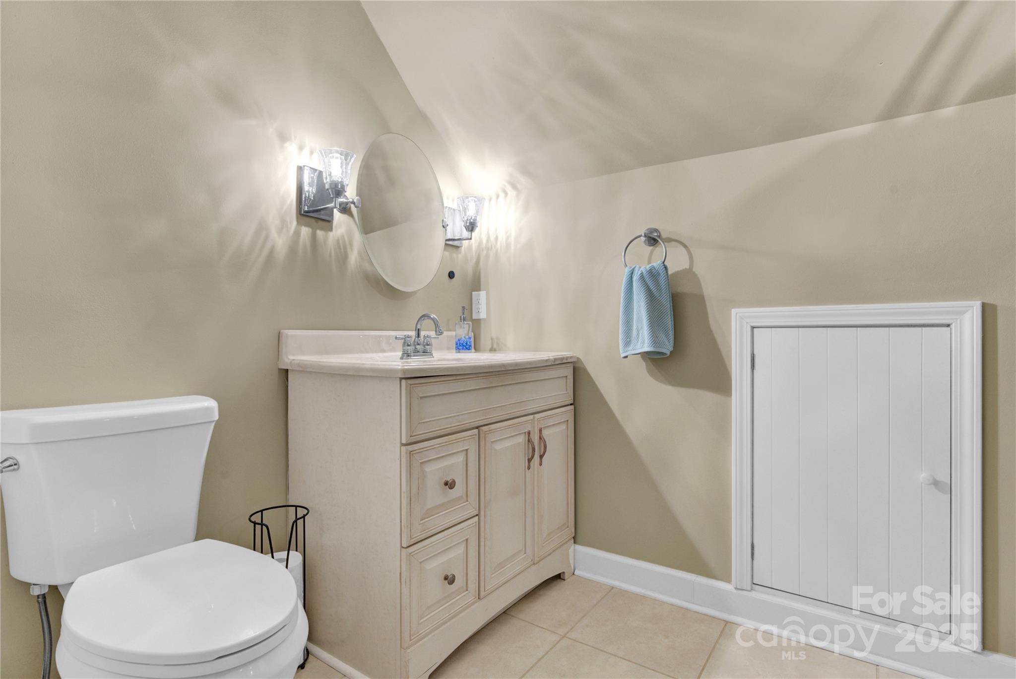 2441 27th Ave Circle Northeast Hickory, NC 28601 - Photo 23 of 45 a bathroom with a toilet sink and mirror