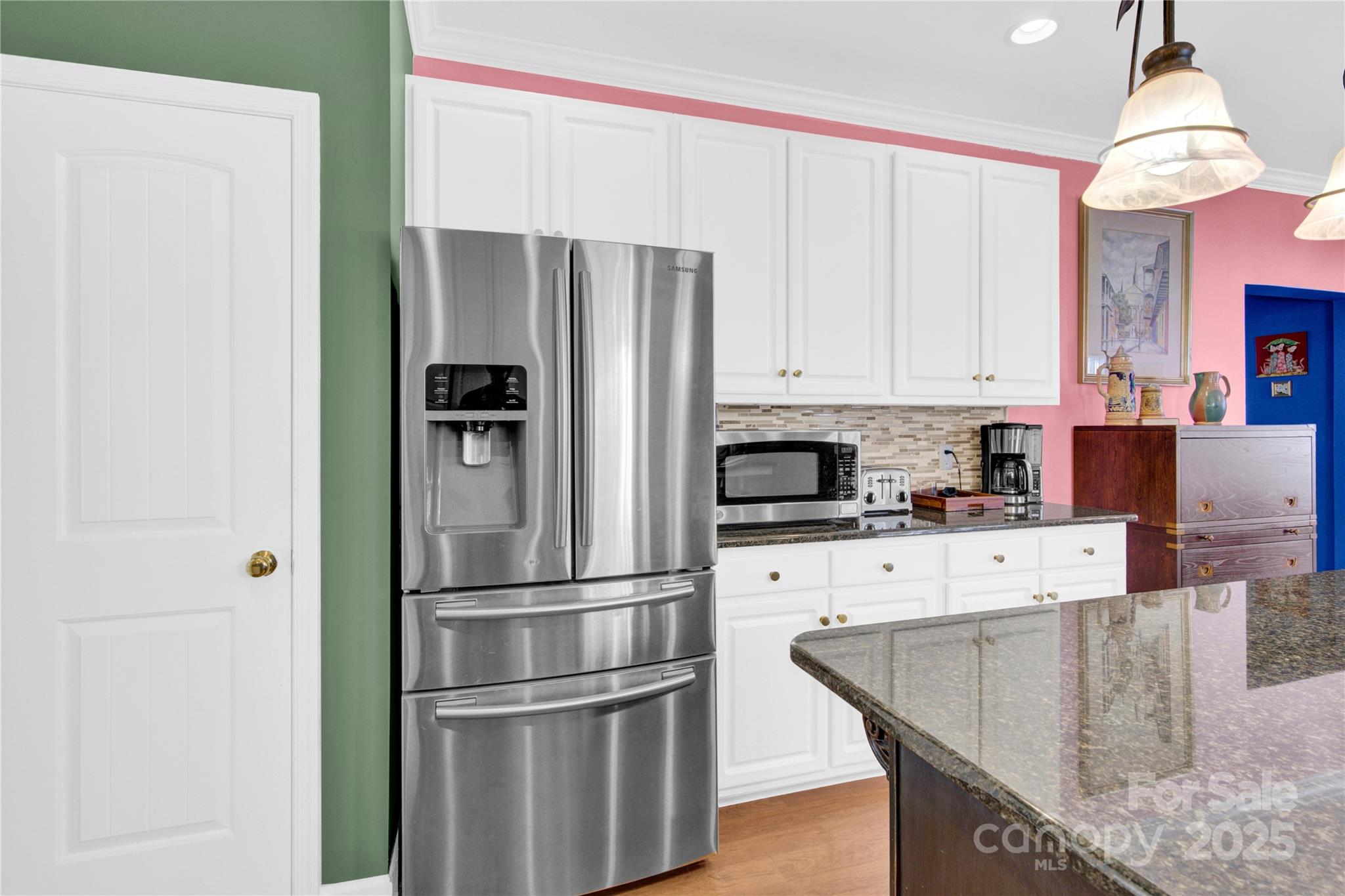 2441 27th Ave Circle Northeast Hickory, NC 28601 - Photo 27 of 45 a kitchen with stainless steel appliances granite countertop a refrigerator a stove and a refrigerator