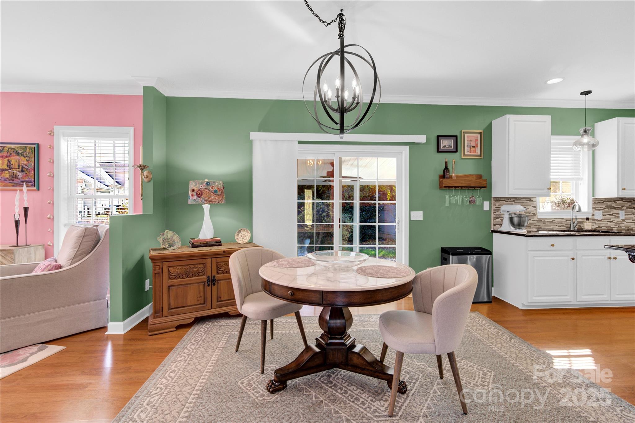 2441 27th Ave Circle Northeast Hickory, NC 28601 - Photo 29 of 45 a view of a dining room with furniture and wooden floor