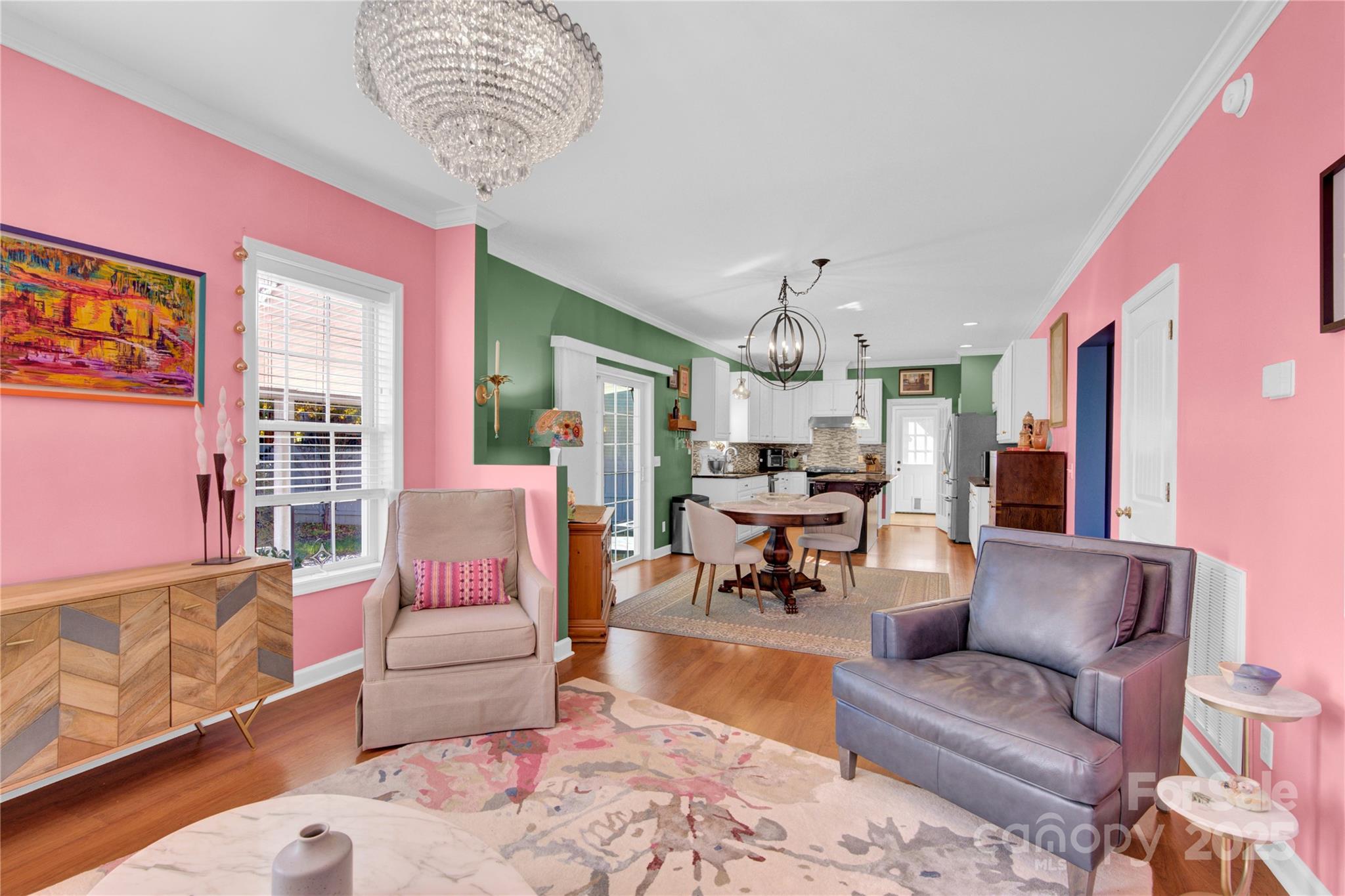 2441 27th Ave Circle Northeast Hickory, NC 28601 - Photo 32 of 45 a living room with furniture and a chandelier