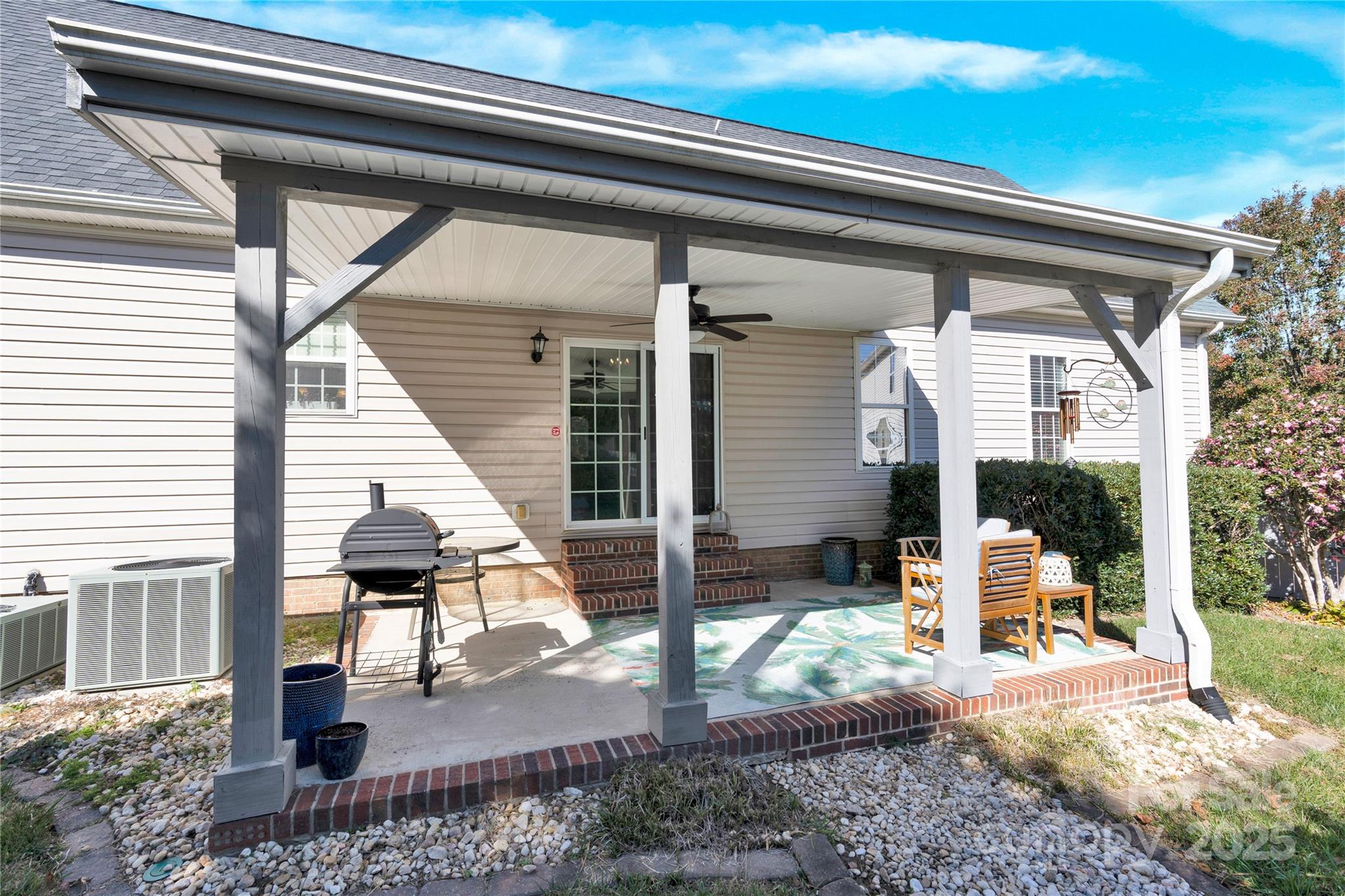 2441 27th Ave Circle Northeast Hickory, NC 28601 - Photo 39 of 45 a view of a porch with furniture and floor to ceiling window