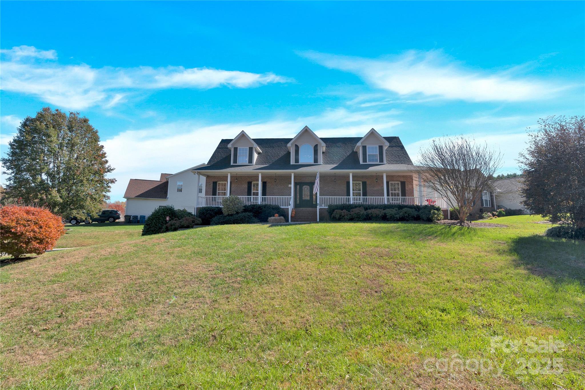 2441 27th Ave Circle Northeast Hickory, NC 28601 - Photo 7 of 45 a front view of a house with a garden