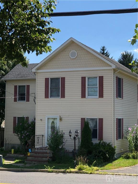 658 Ridge Road Monmouth Junction, NJ 08852 - Photo 1 of 11 a front view of a house with a yard