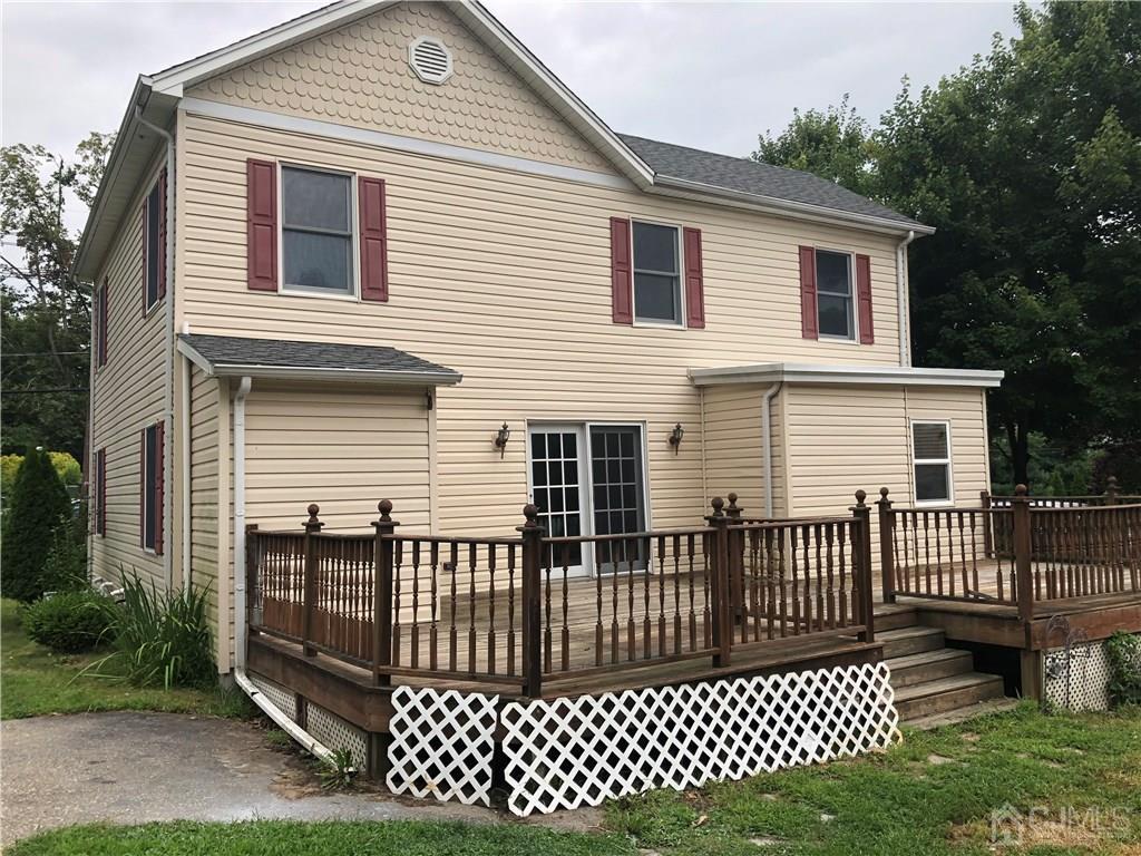 658 Ridge Road Monmouth Junction, NJ 08852 - Photo 10 of 11 a front view of a house