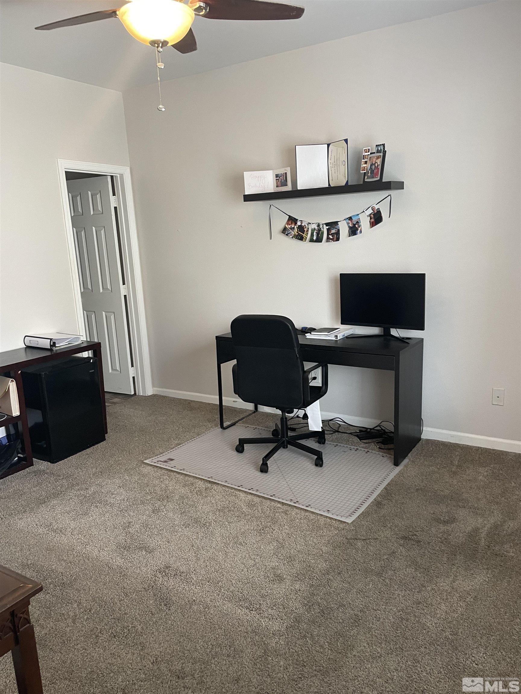 200 Talus Way, Unit 421 Reno, NV 89503 - Photo 14 of 23 a room with furniture and window