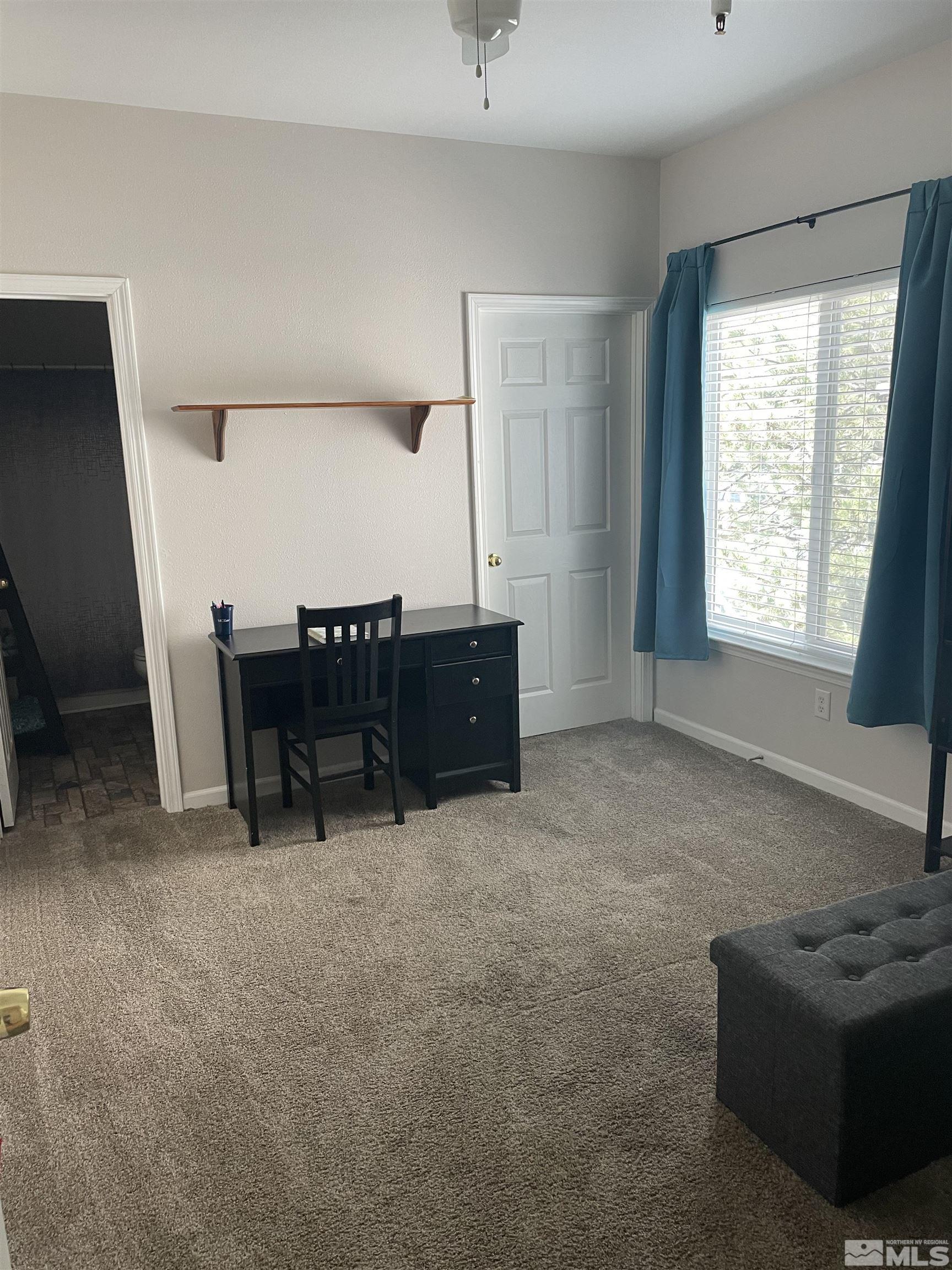 200 Talus Way, Unit 421 Reno, NV 89503 - Photo 18 of 23 a living room with furniture and a window