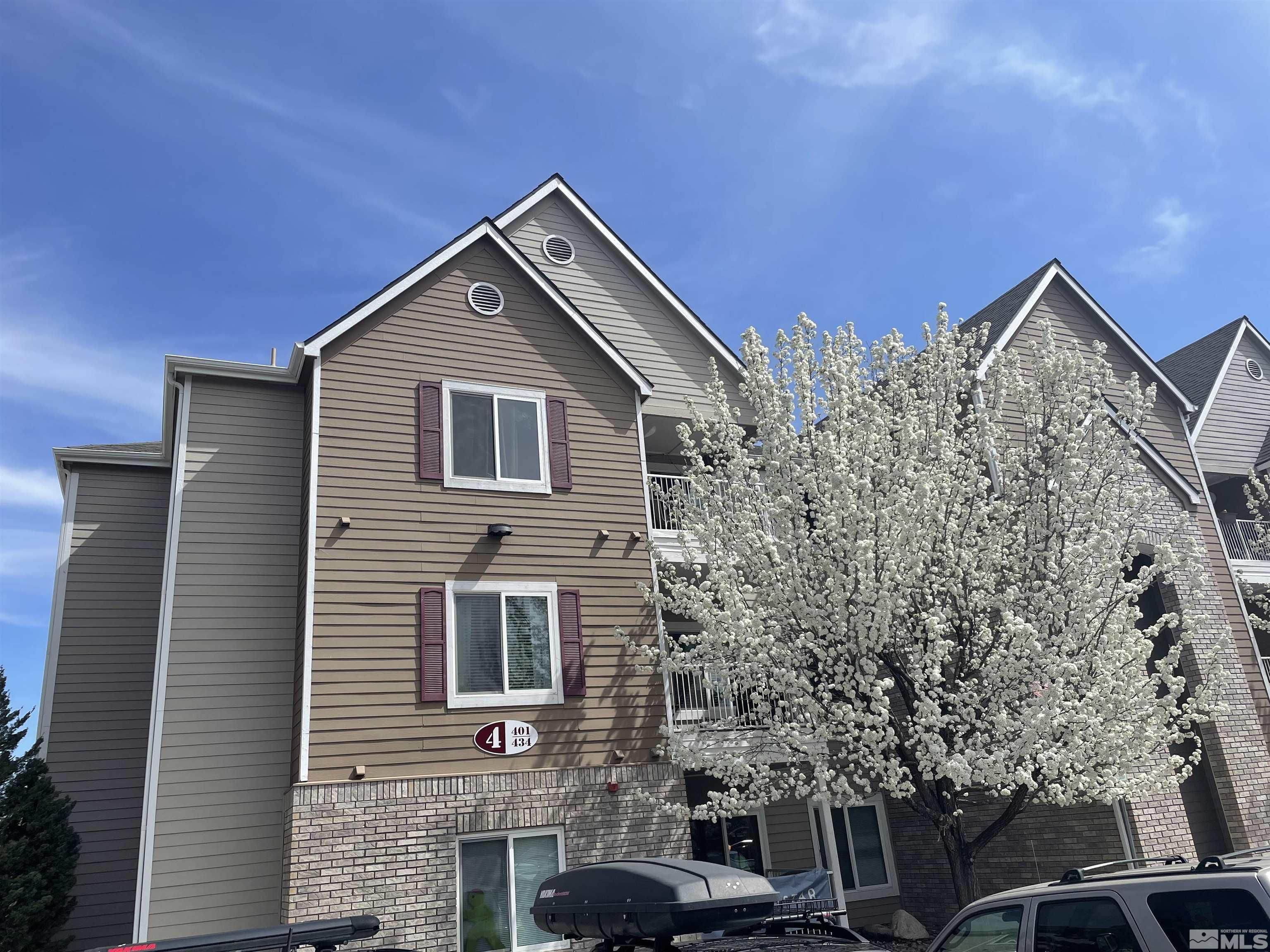 200 Talus Way, Unit 421 Reno, NV 89503 - Photo 21 of 23 a front view of a house with a yard