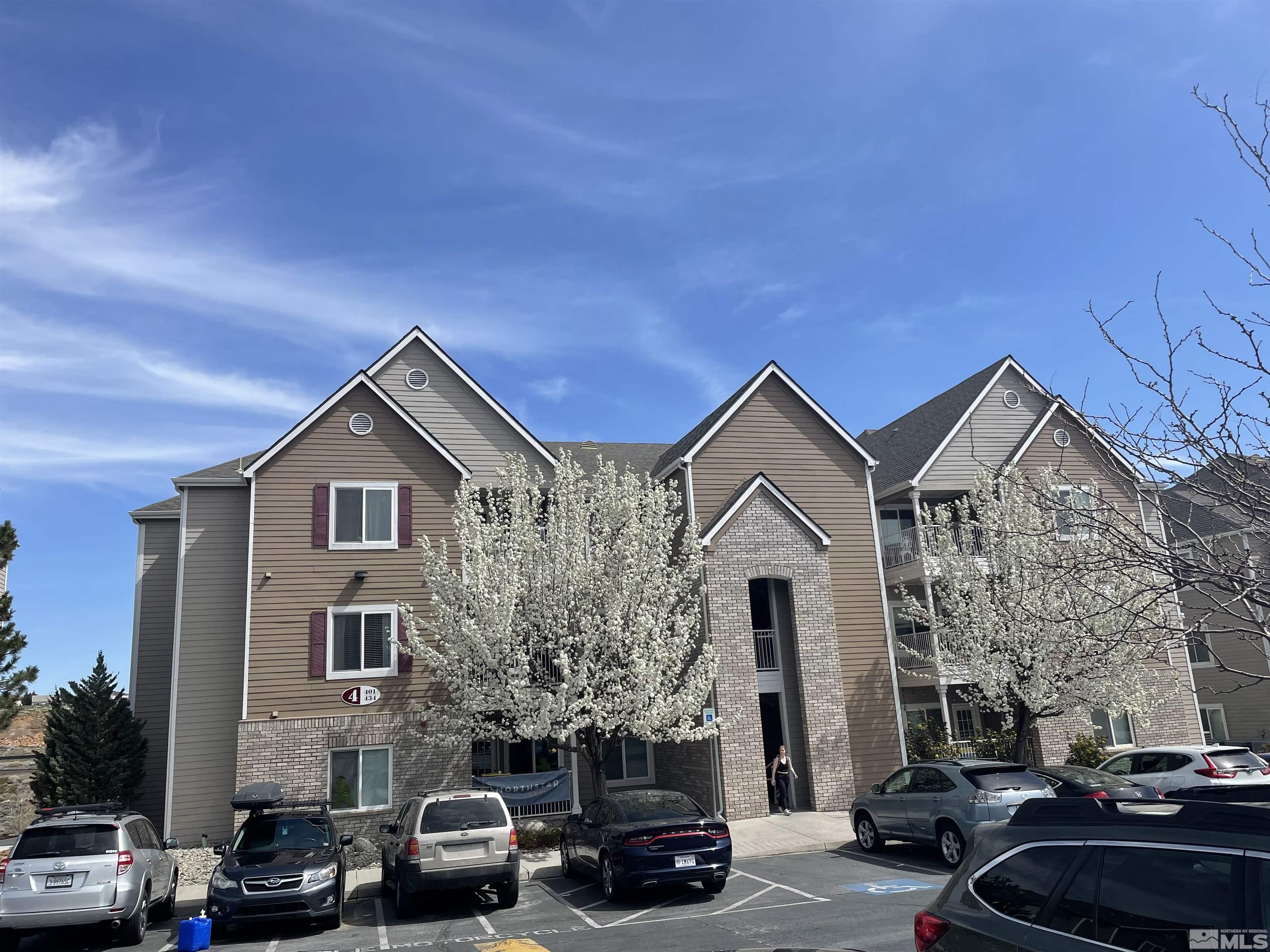 200 Talus Way, Unit 421 Reno, NV 89503 - Photo 22 of 23 a view of a car parked in front of a house