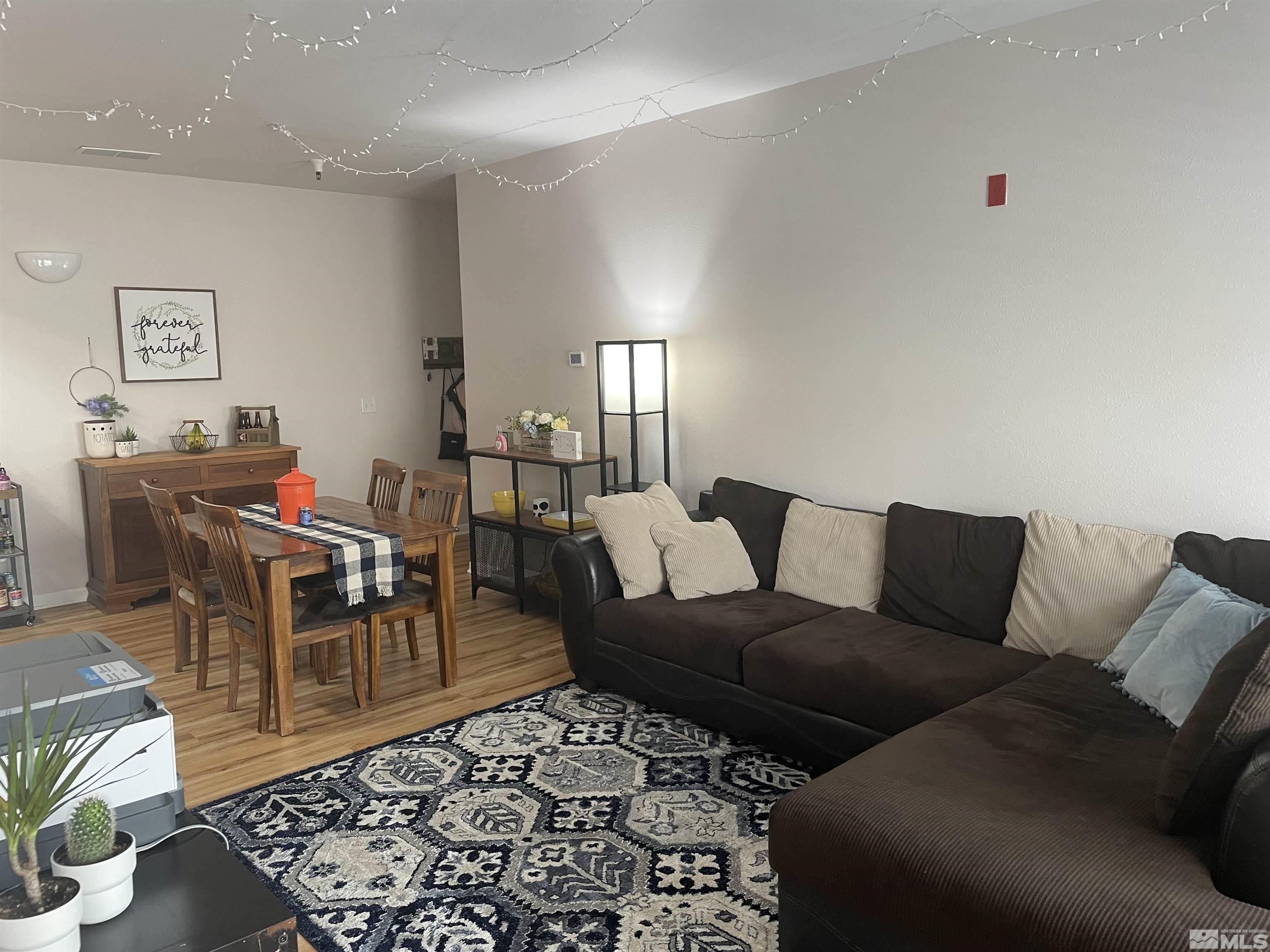 200 Talus Way, Unit 421 Reno, NV 89503 - Photo 6 of 23 a living room with furniture and a rug