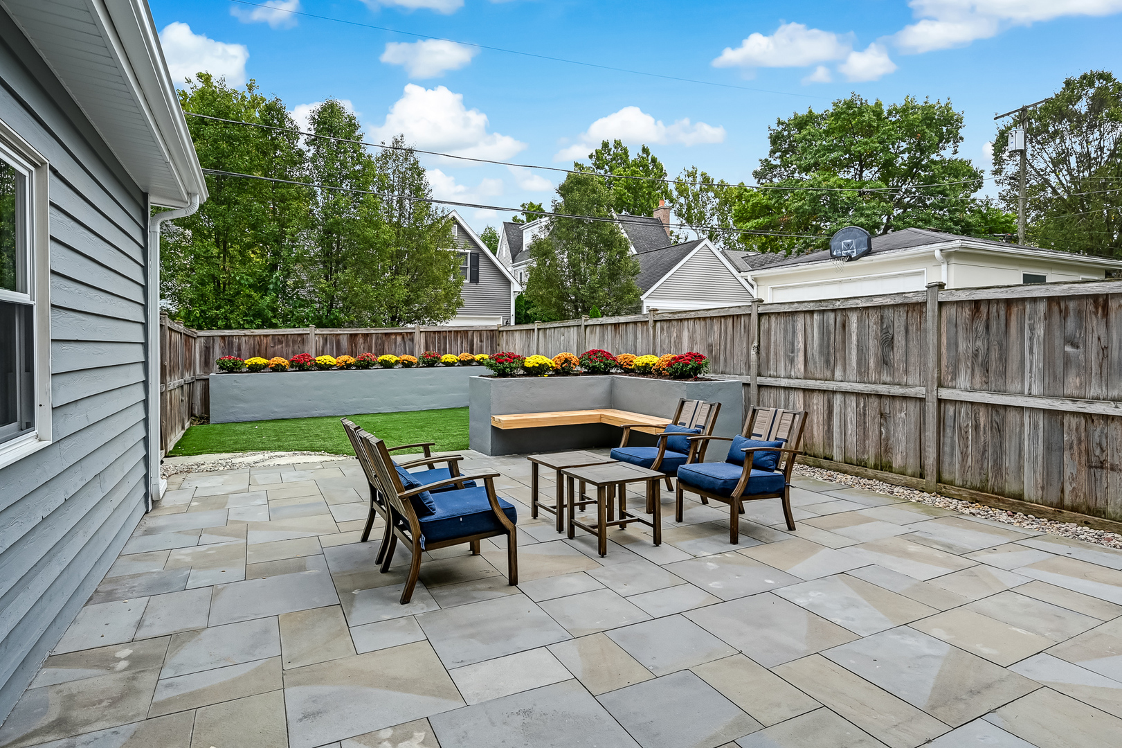 213 South Adams Street Hinsdale, IL 60521 - Photo 28 of 33 a view of a patio with table and chairs and wooden fence