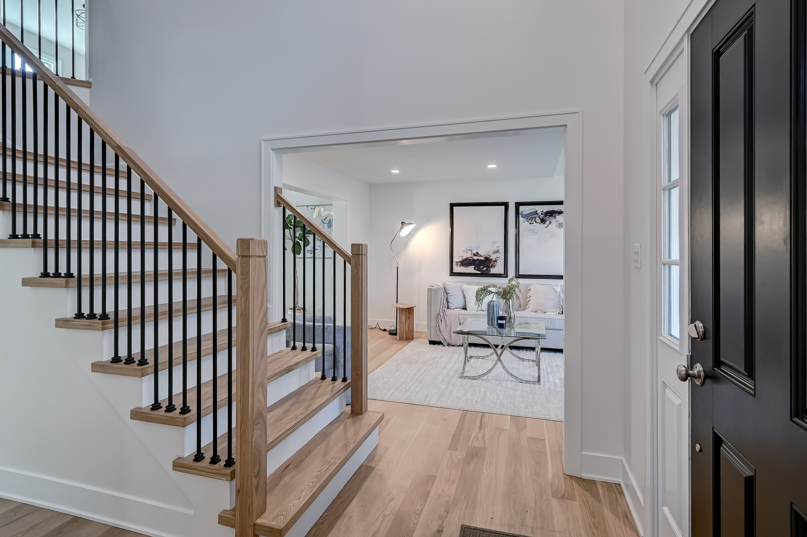 213 South Adams Street Hinsdale, IL 60521 - Photo 3 of 33 a view of a hallway with wooden floor and furniture