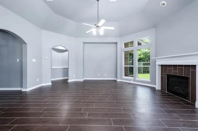 a kitchen with stainless steel appliances granite countertop a stove top oven a sink a counter top space and cabinets